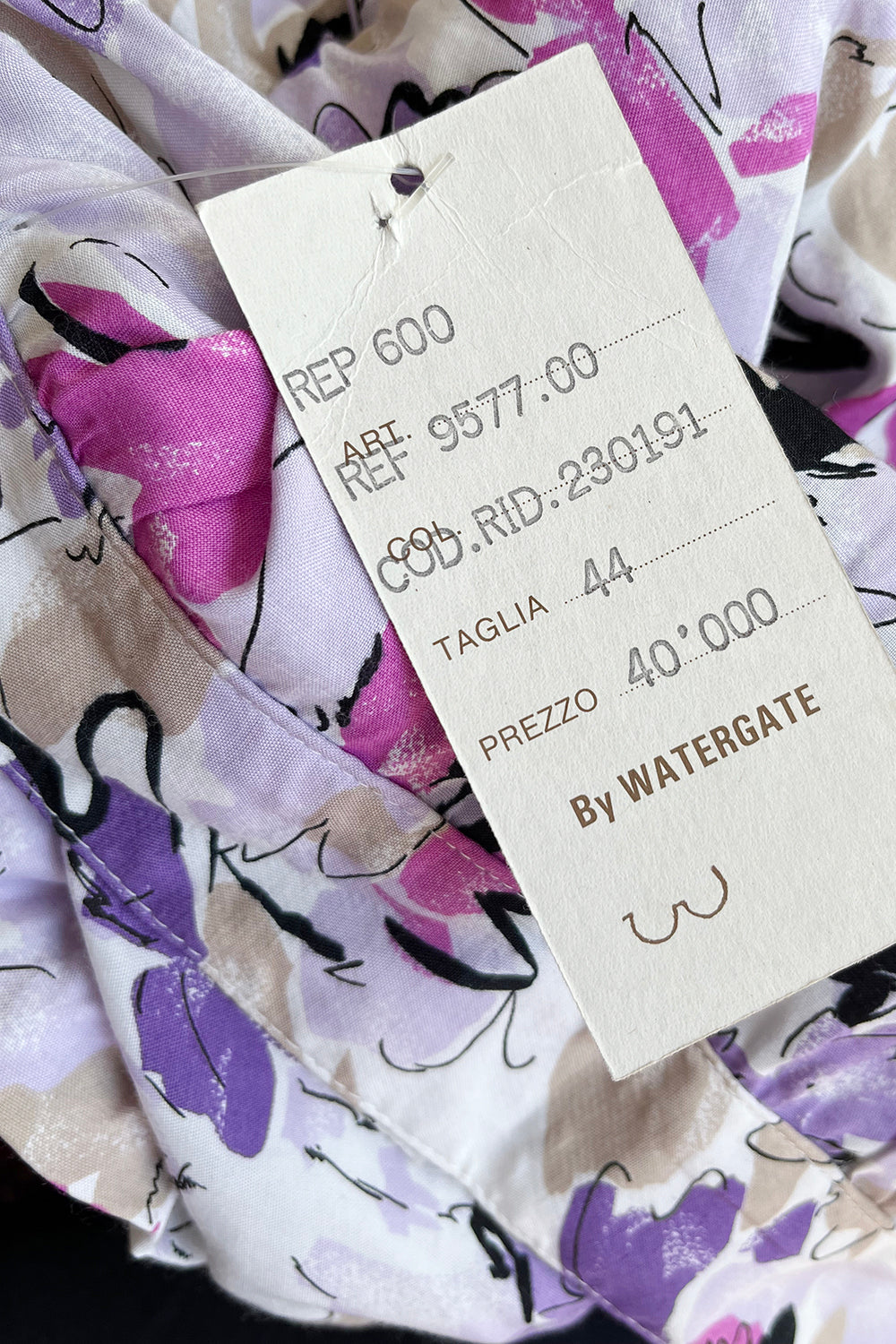 Vintage jaren 90 deadstock ruffle kokerrok wit-multi detail - close-up van originele label