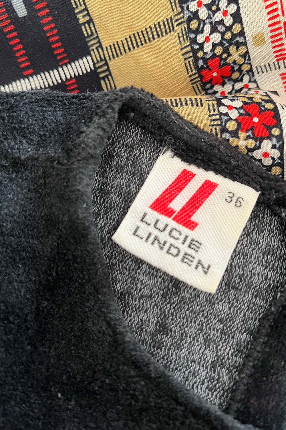Vintage jaren 70 Lucie Linden jurk zwart-rood-beige-wit detail fluweel - close-up van het label