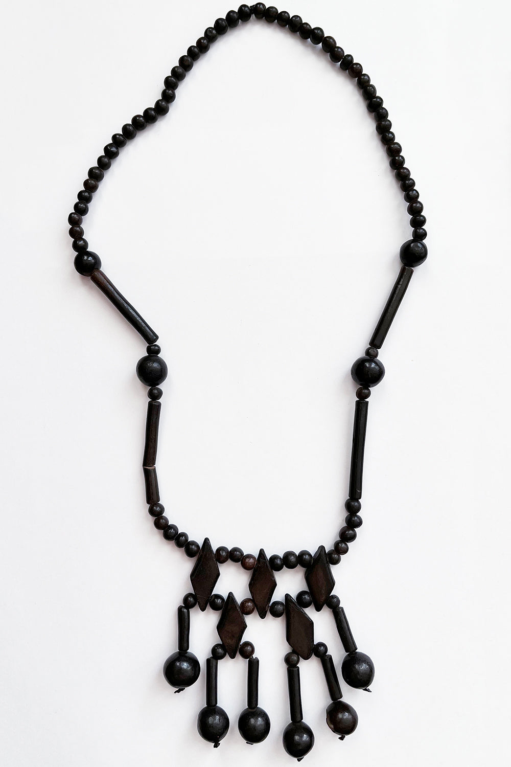 Handgemaakte vintage 1970s houten kralenketting donkerbruin gelakt, 66 cm, authentiek vintage