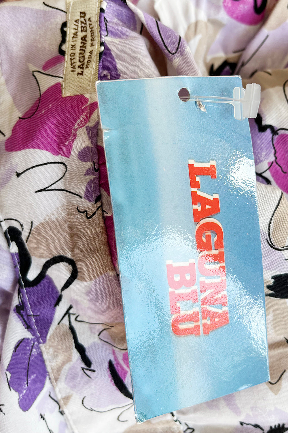 Vintage jaren 90 deadstock ruffle kokerrok wit-multi detail - close-up van label