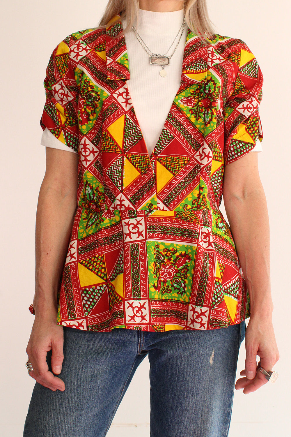 Vintage jaren 70 handgemaakte Afrikaanse batik peplum tuniek rood-groen-oranje-geel-wit - katoenen tuniek met V-hals maat 34